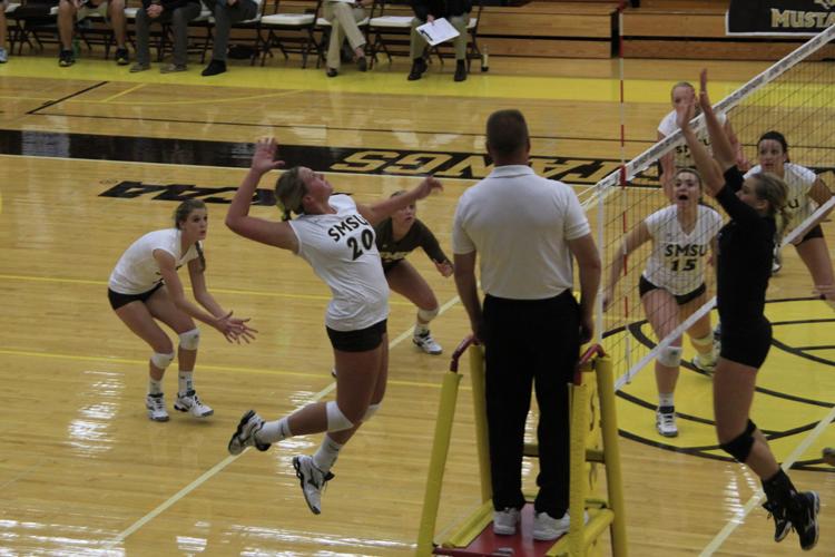 Freshman Abbey Thissen goes in for an impressive spike at the game on Tuesday night.