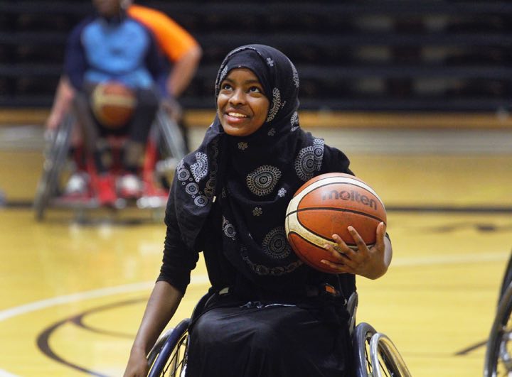 Upward Bound students learn from wheelchair basketball players