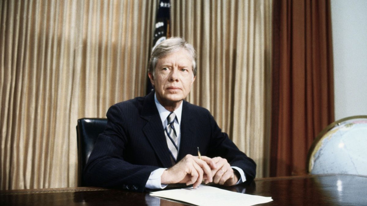 Jimmy Carter sat at the Oval Office.